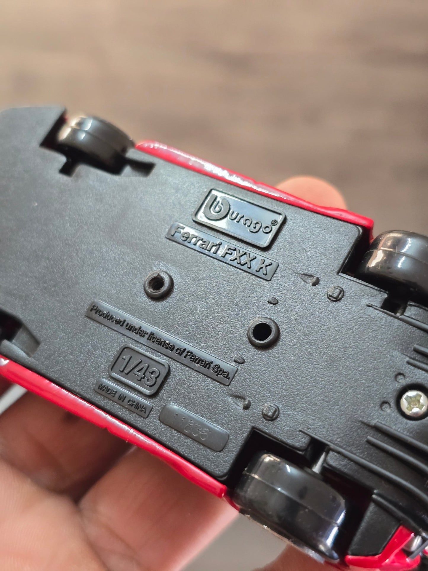 1:43 Bburago Ferrari FXX K Number 10 - Red (Uncarded - New) - Kinder Logs