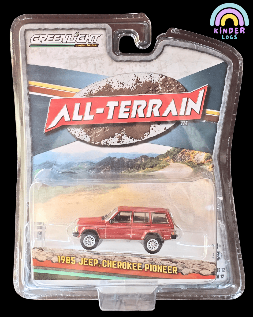 Greenlight 1985 Jeep Cherokee Pioneer All - Terrain (Open Blister) - Kinder Logs