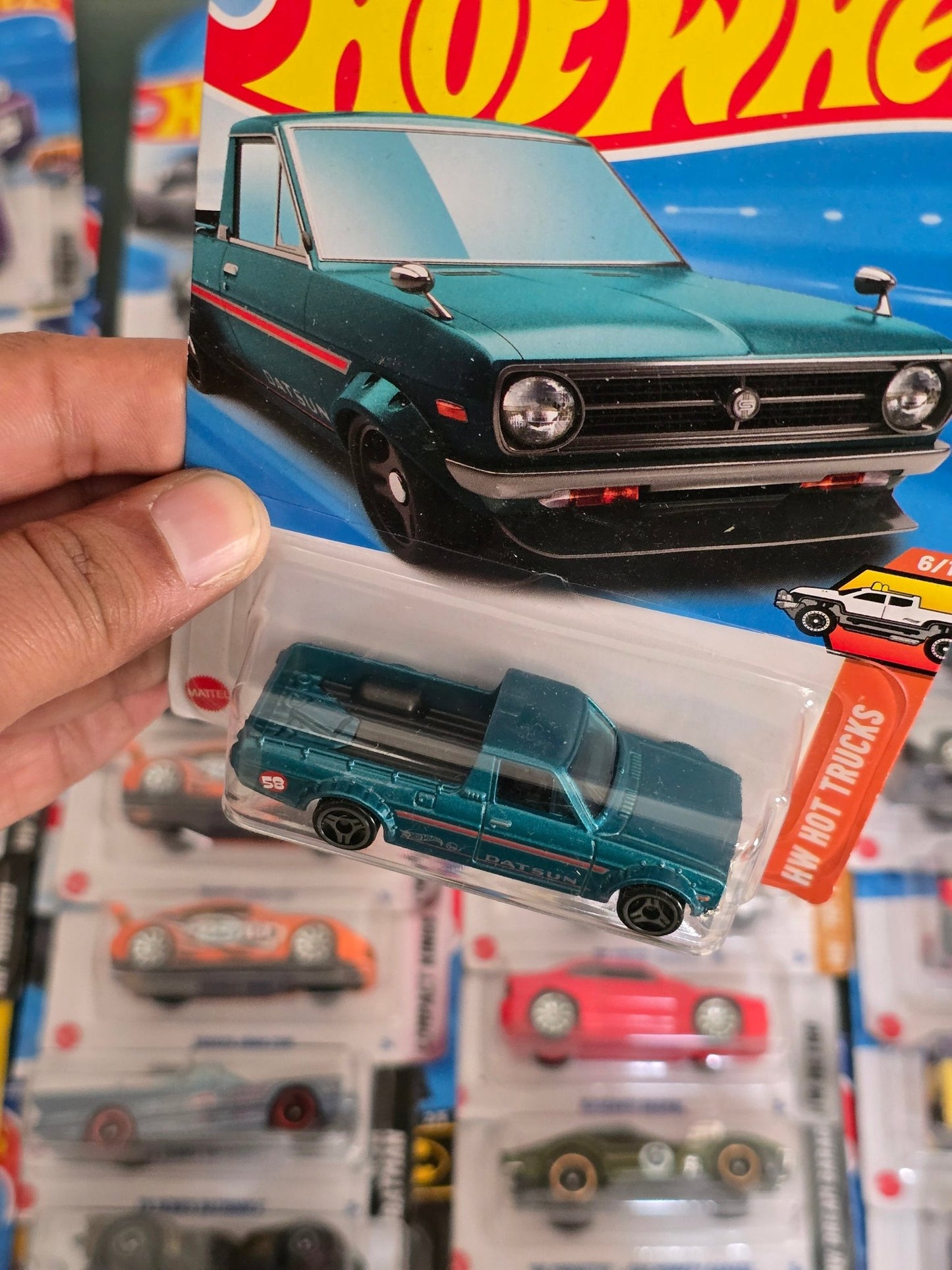 Hot Wheels 1975 Datsun Sunny Truck B120 (Imported) - Kinder Logs