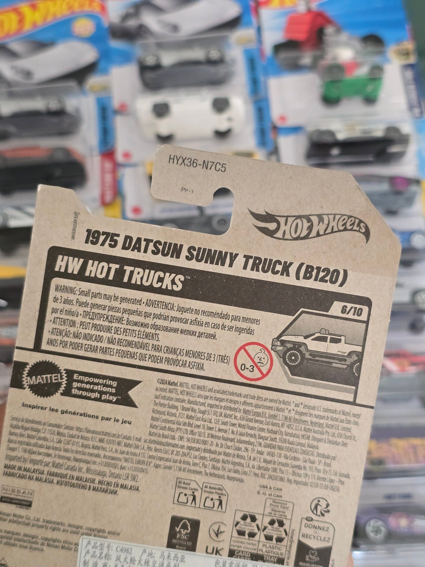 Hot Wheels 1975 Datsun Sunny Truck B120 (Imported) - Kinder Logs