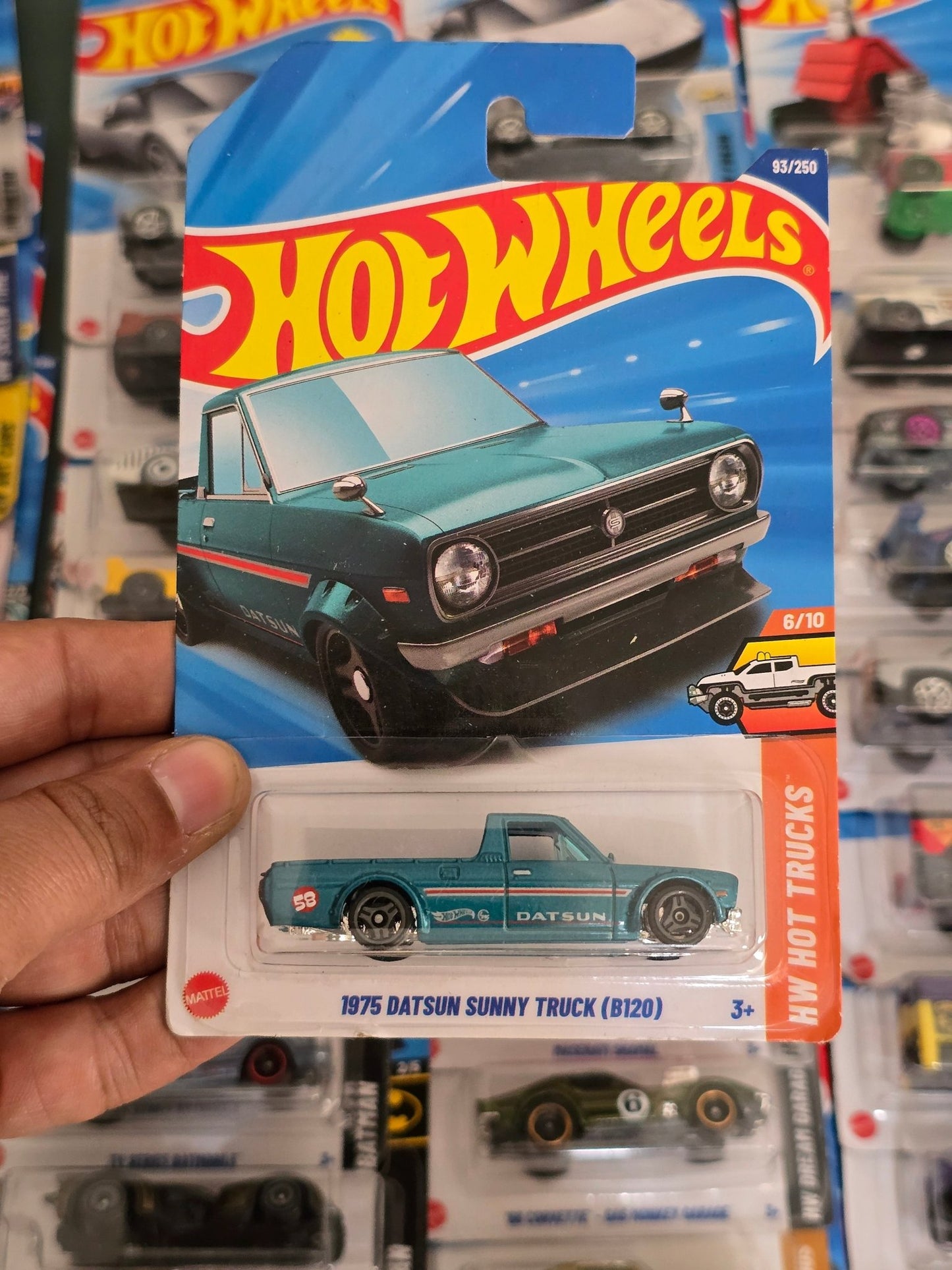 Hot Wheels 1975 Datsun Sunny Truck B120 (Imported) - Kinder Logs