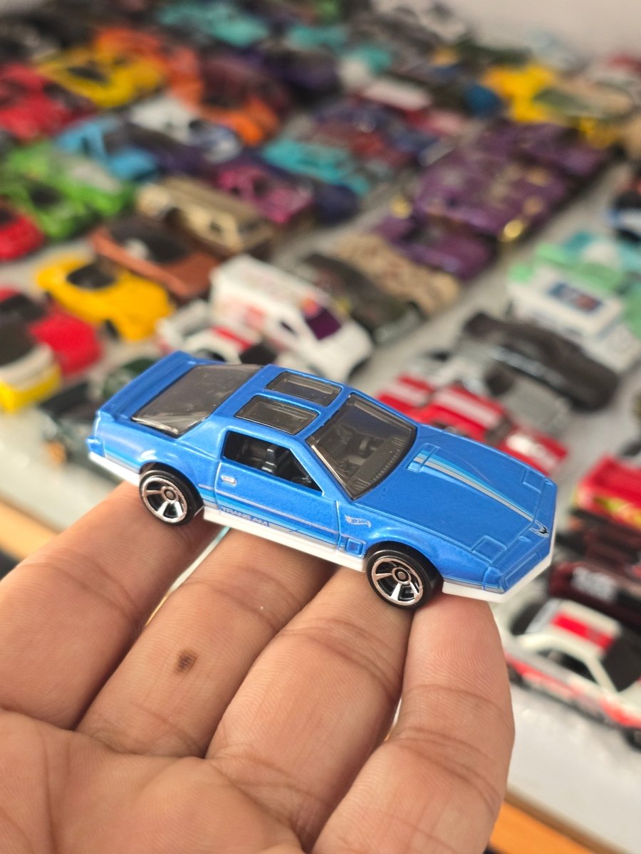 Hot Wheels 1984 Pontiac Firebird - Blue (Uncarded) - Kinder Logs