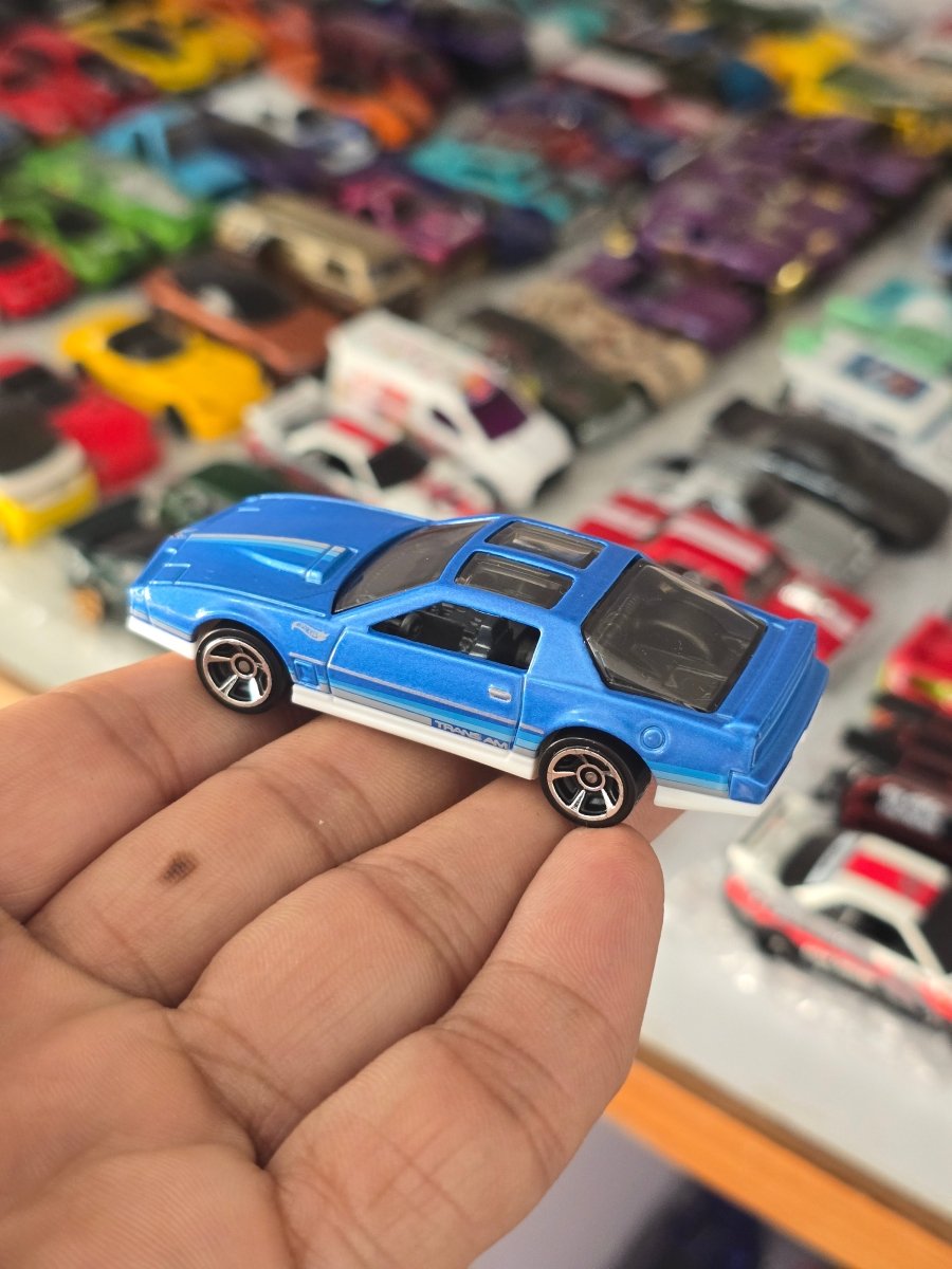 Hot Wheels 1984 Pontiac Firebird - Blue (Uncarded) - Kinder Logs