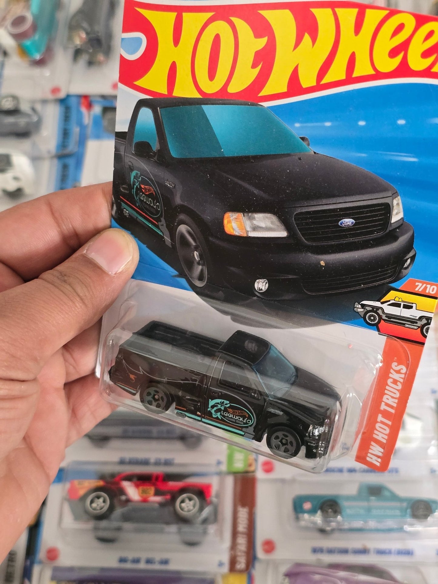 Hot Wheels 1999 Ford F - 150 SVT Lightning (Imported) - Kinder Logs