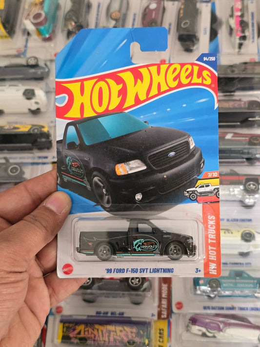 Hot Wheels 1999 Ford F - 150 SVT Lightning (Imported) - Kinder Logs