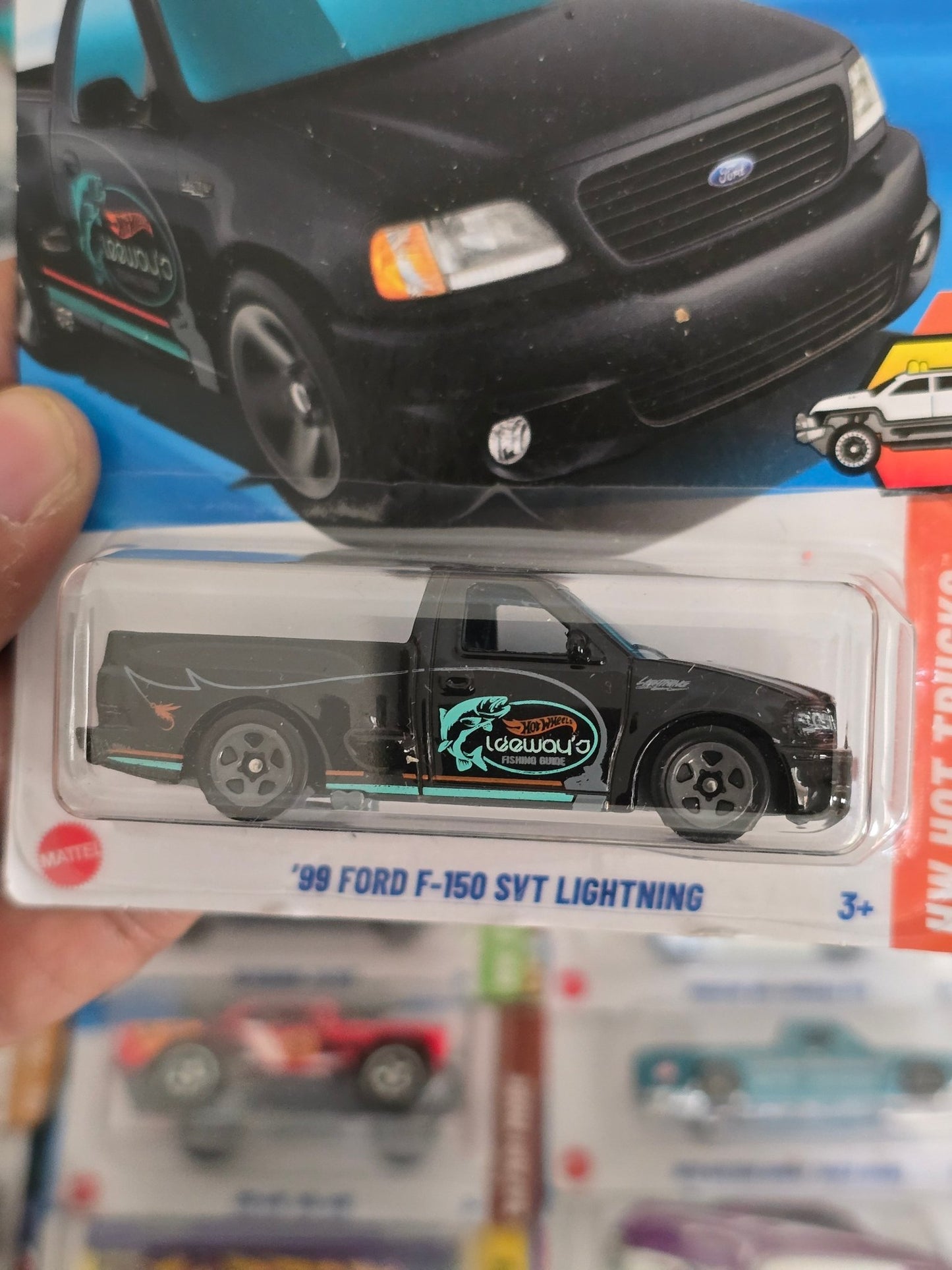 Hot Wheels 1999 Ford F - 150 SVT Lightning (Imported) - Kinder Logs