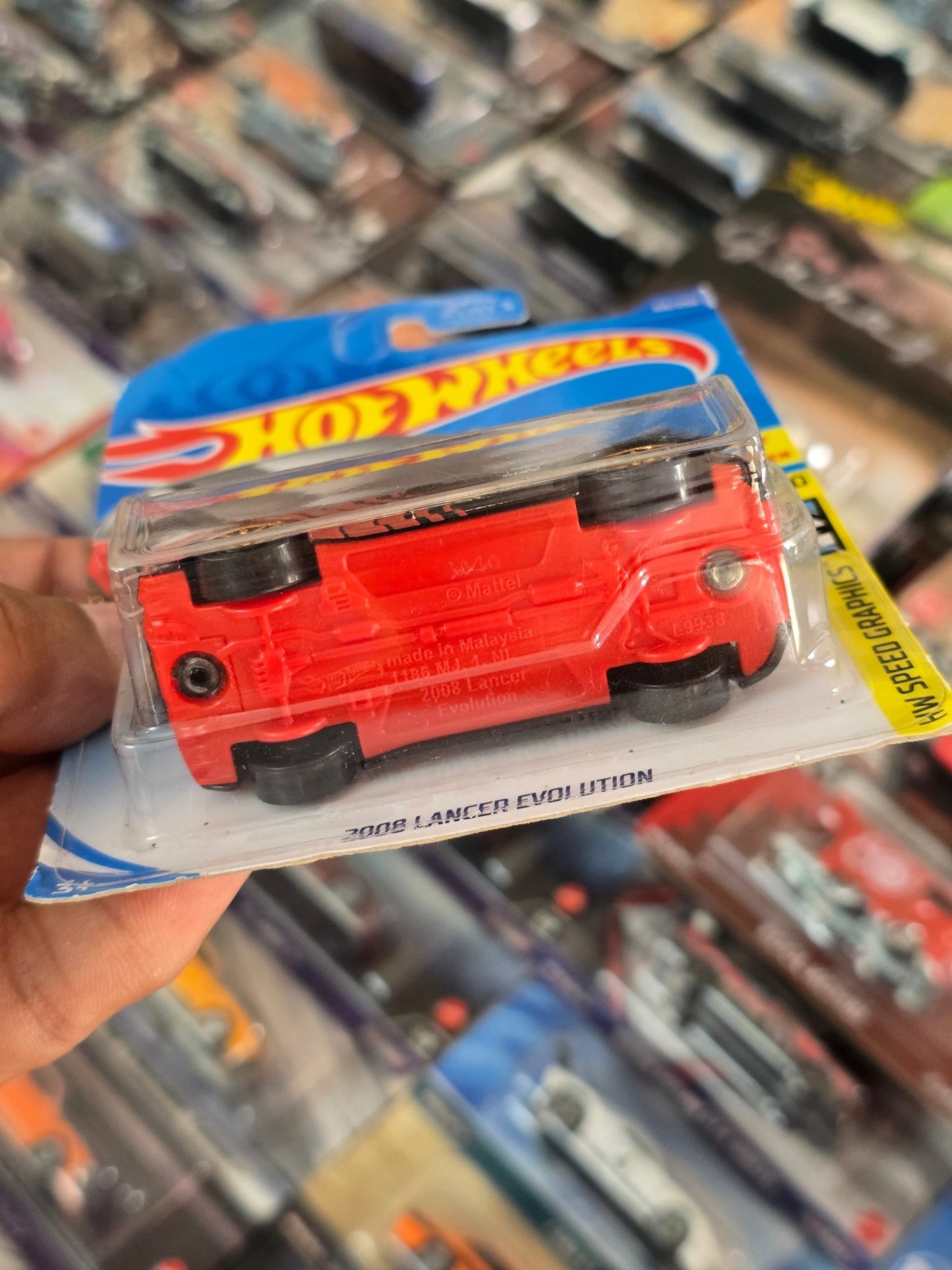 Hot Wheels 2008 Mitsubishi Lancer Evolution Advan Edition (Imported) - Kinder Logs