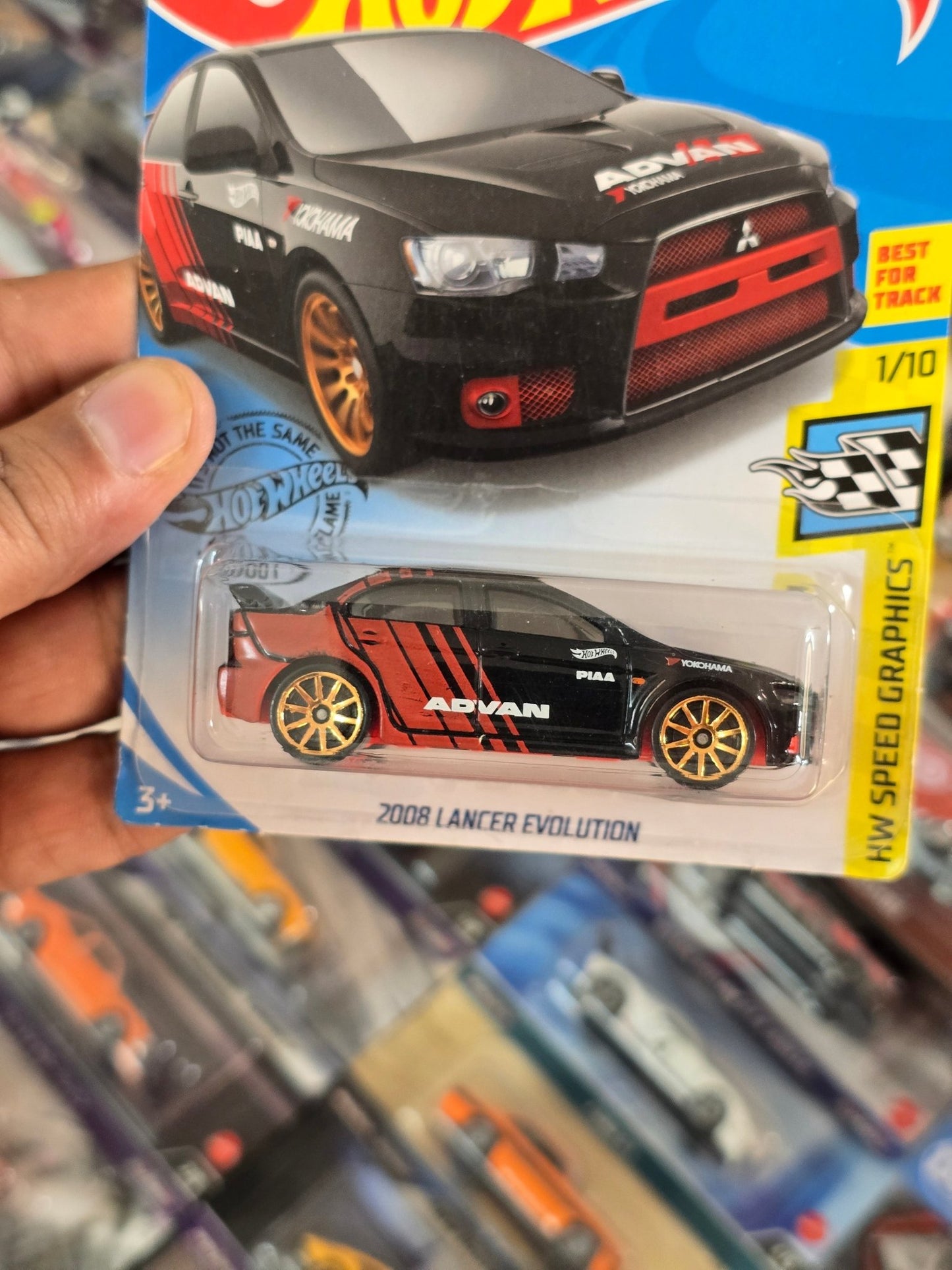 Hot Wheels 2008 Mitsubishi Lancer Evolution Advan Edition (Imported) - Kinder Logs