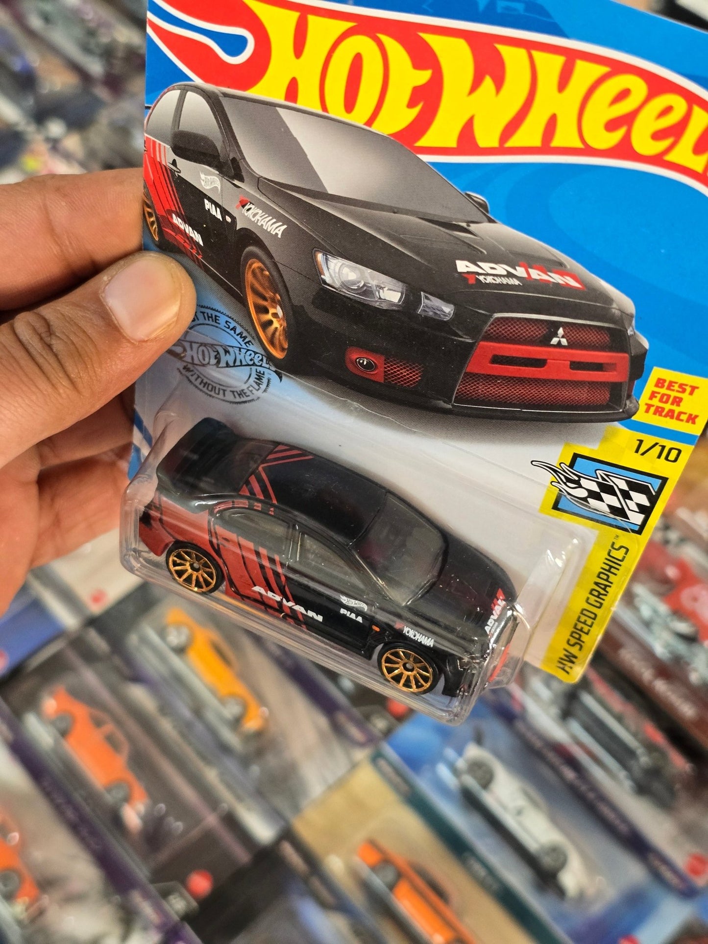 Hot Wheels 2008 Mitsubishi Lancer Evolution Advan Edition (Imported) - Kinder Logs