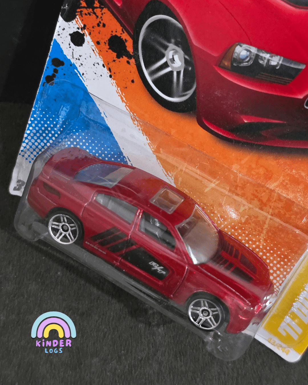 Hot Wheels 2011 Dodge Charger R/T - Red (Imported) - Kinder Logs
