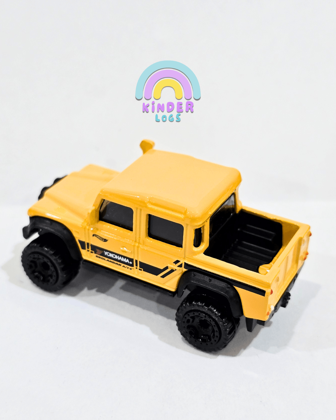 Hot Wheels 2015 Land Rover Defender Double Cab - Yellow (Uncarded - New) - Kinder Logs