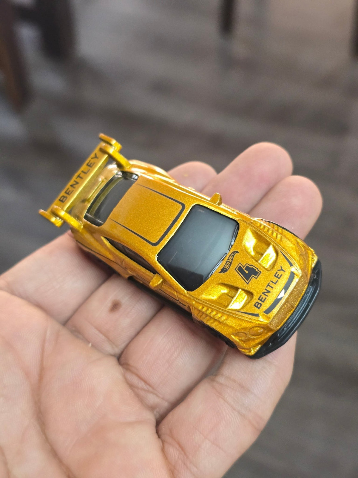 Hot Wheels 2018 Bentley Continental GT3 - Gold (Uncarded - New) - Kinder Logs