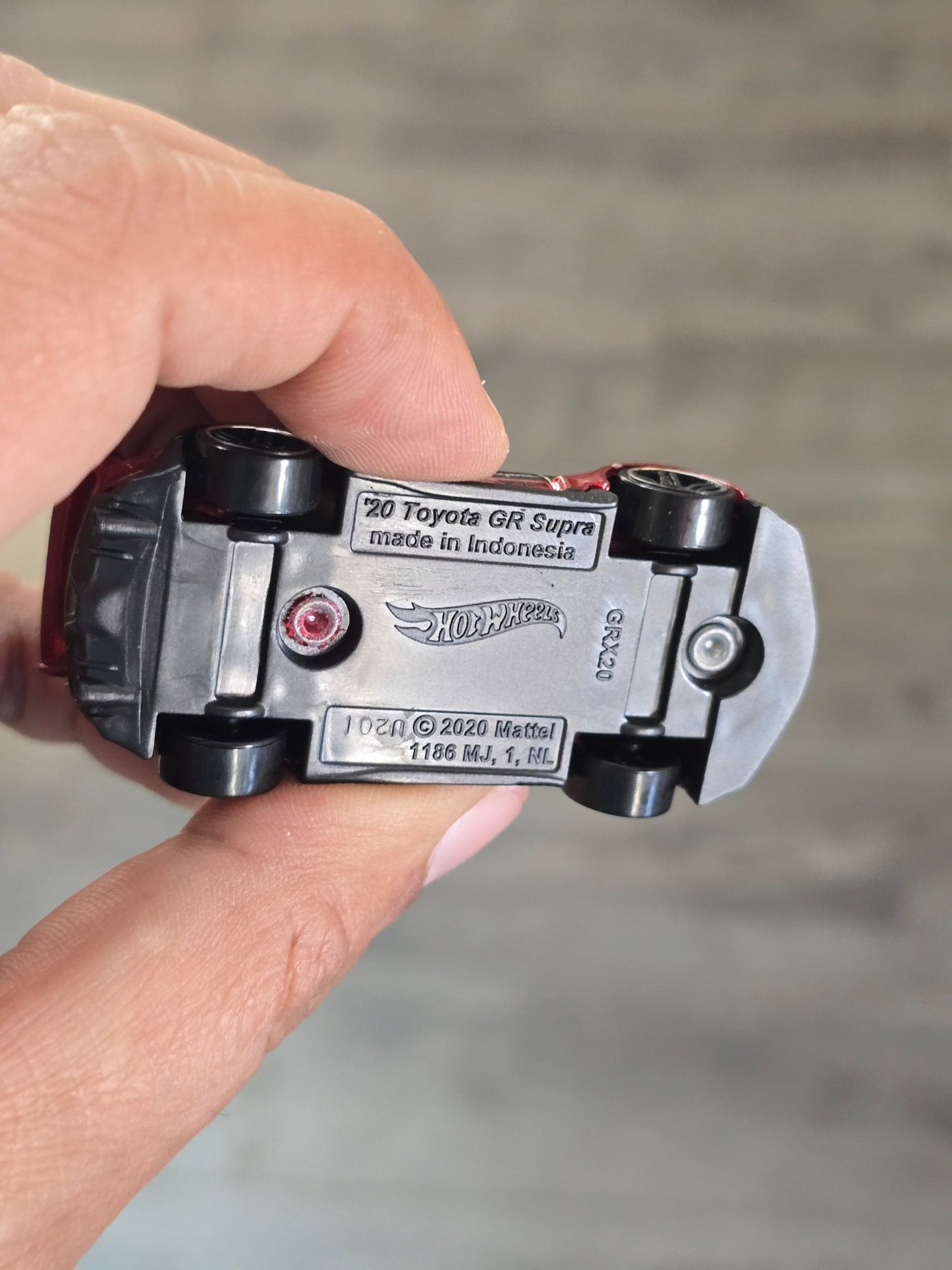 Hot Wheels 2020 Toyota GR Supra - Metallic Red (Uncarded - New) - Kinder Logs