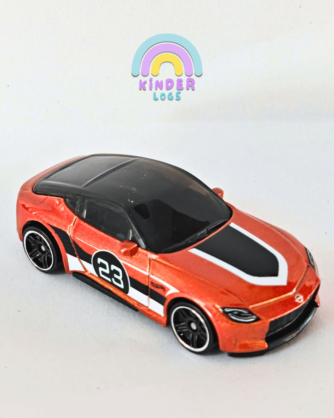 Hot Wheels 2023 Nissan Z - Orange (Uncarded - New) - Kinder Logs