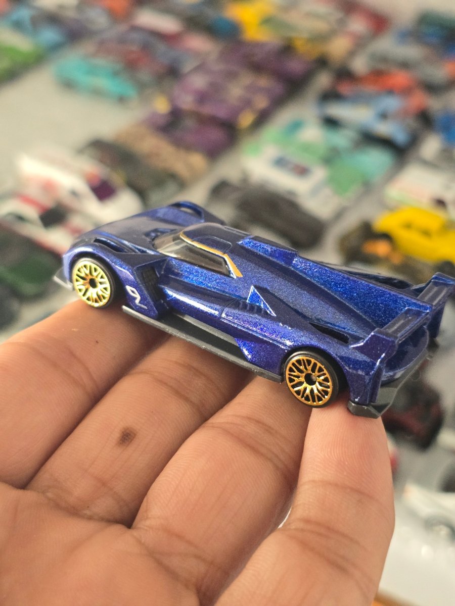 Hot Wheels Cadillac Project GTP Hypercar (Uncarded) - Kinder Logs