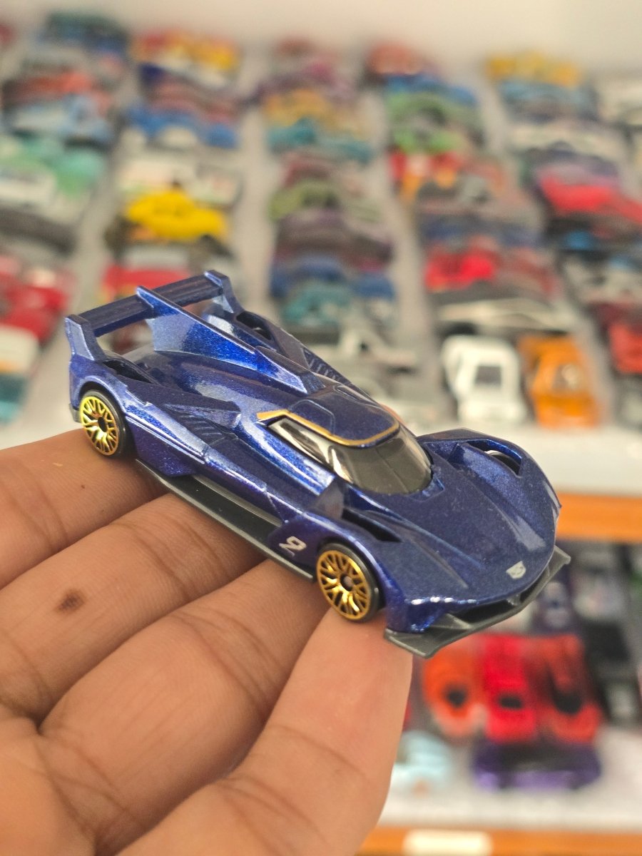 Hot Wheels Cadillac Project GTP Hypercar (Uncarded) - Kinder Logs