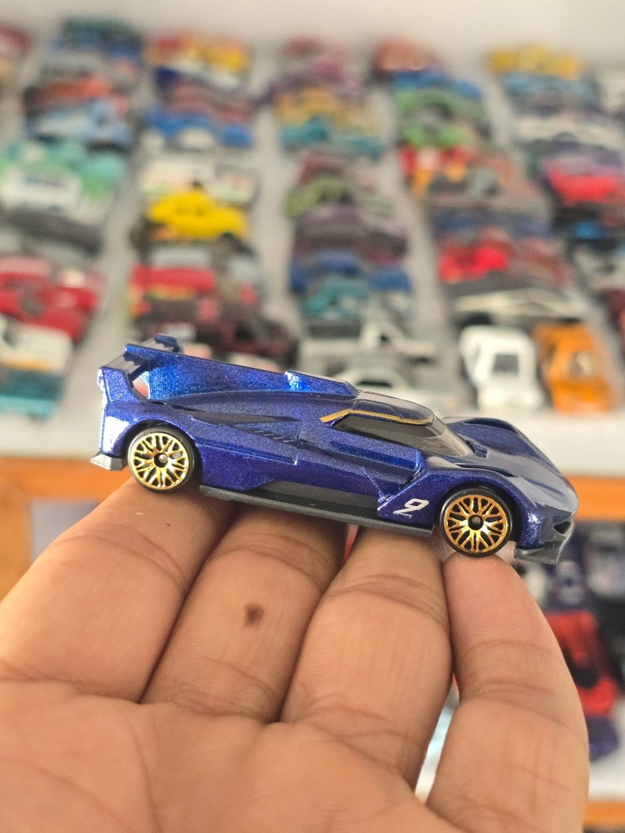 Hot Wheels Cadillac Project GTP Hypercar (Uncarded) - Kinder Logs