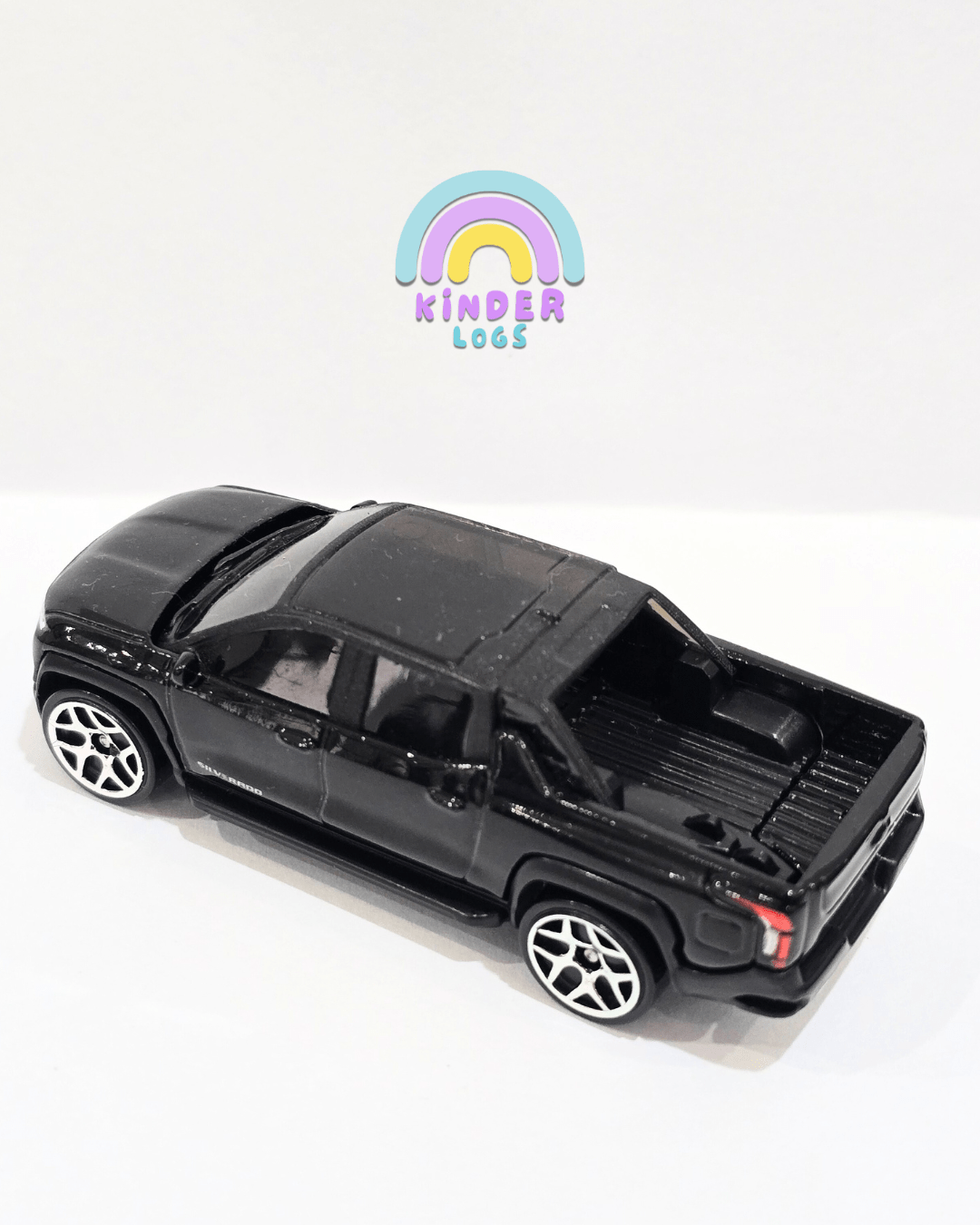 Hot Wheels Chevrolet Silverado EV RST - Black (Uncarded) - Kinder Logs