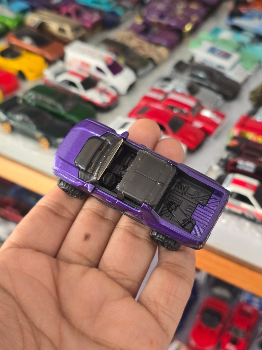 Hot Wheels GMC Hummer EV - Purple (Uncarded) - Kinder Logs