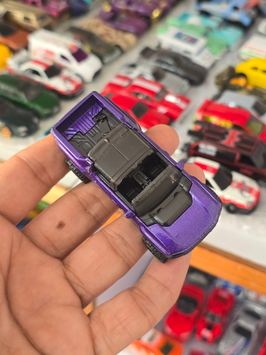 Hot Wheels GMC Hummer EV - Purple (Uncarded) - Kinder Logs