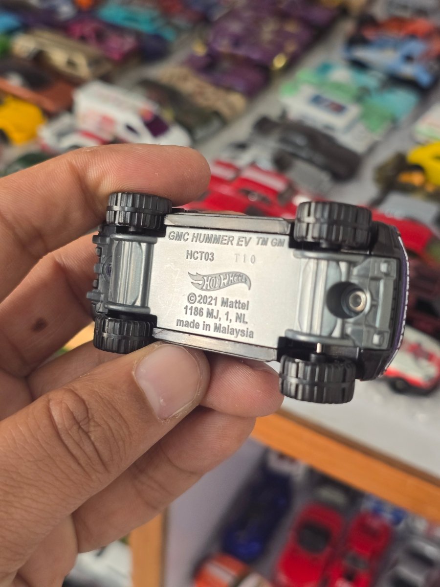 Hot Wheels GMC Hummer EV - Purple (Uncarded) - Kinder Logs