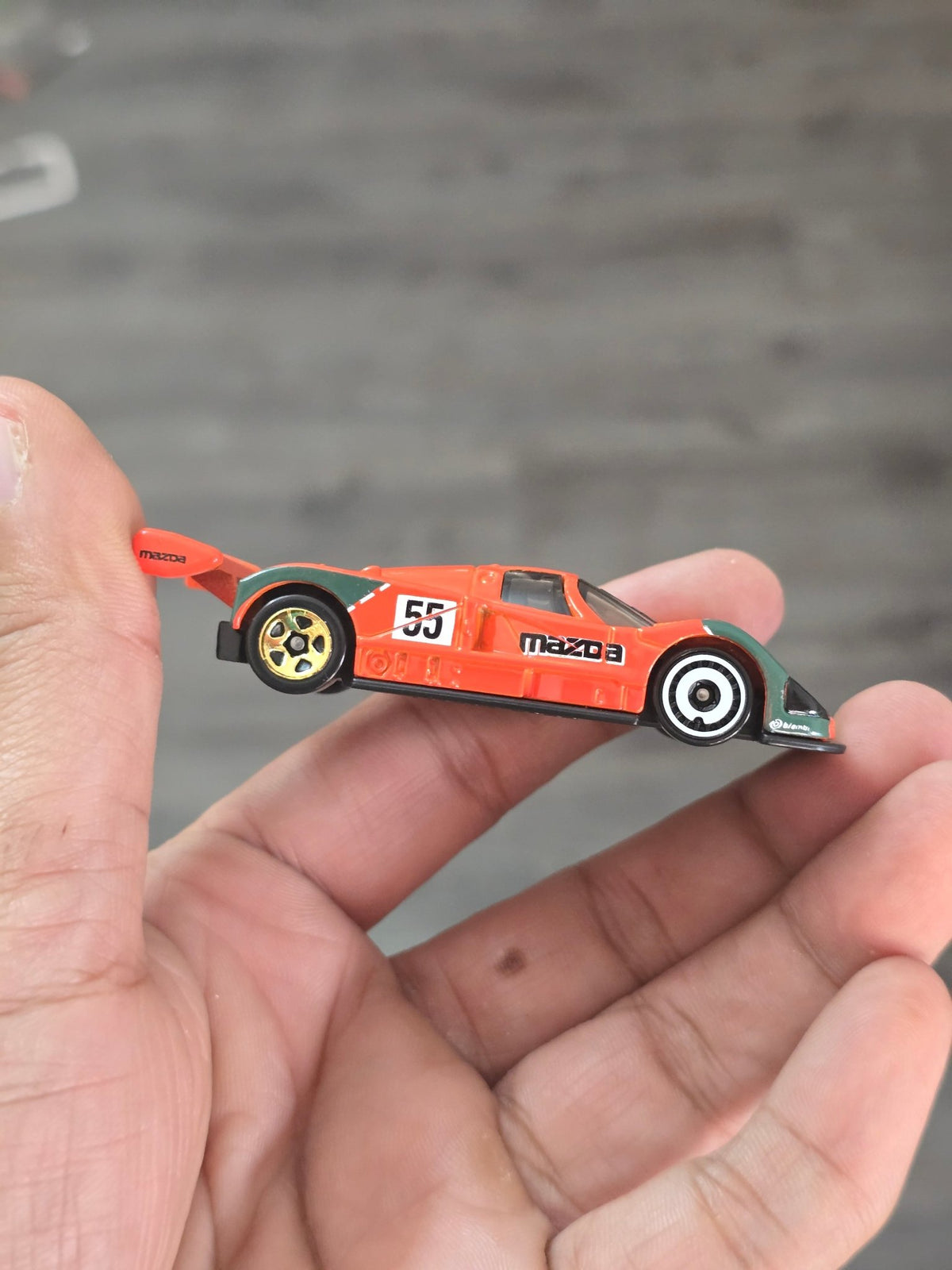 Hot Wheels Mazda 787B - Orange (Uncarded - New) - Kinder Logs