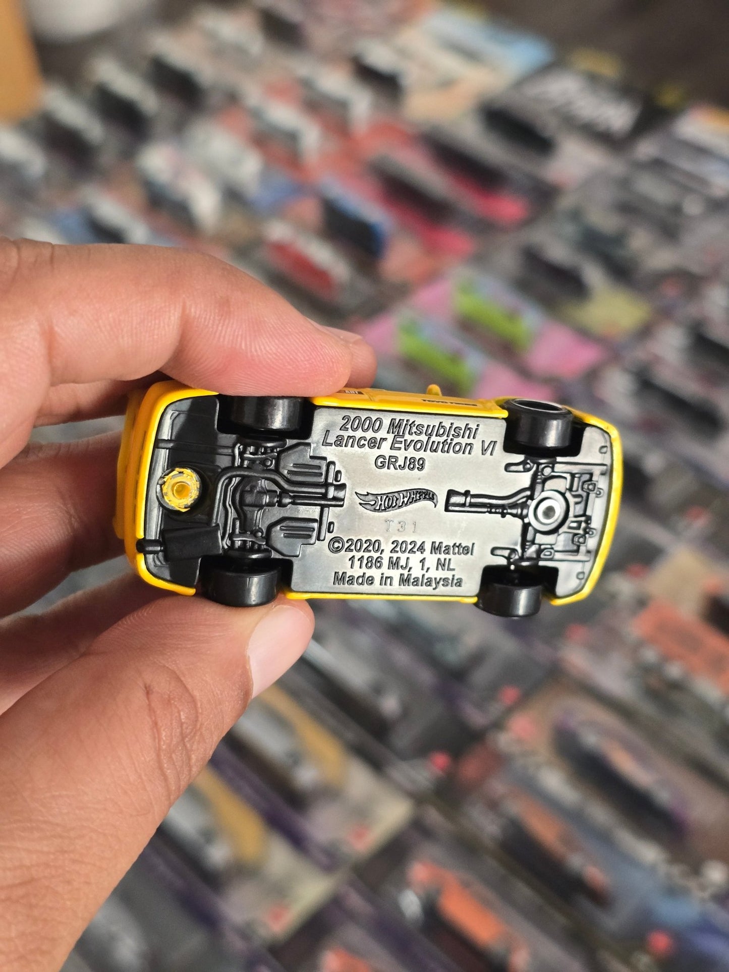 Hot Wheels Mitsubishi Lancer Evolution VI - Yellow (Uncarded) - Kinder Logs