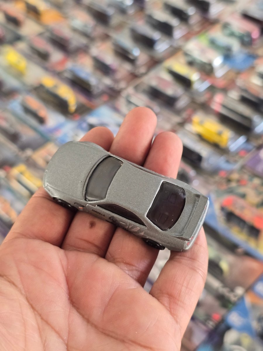 Hot Wheels Nissan Skyline GT - R R33 GODZILLA (Uncarded) - Kinder Logs