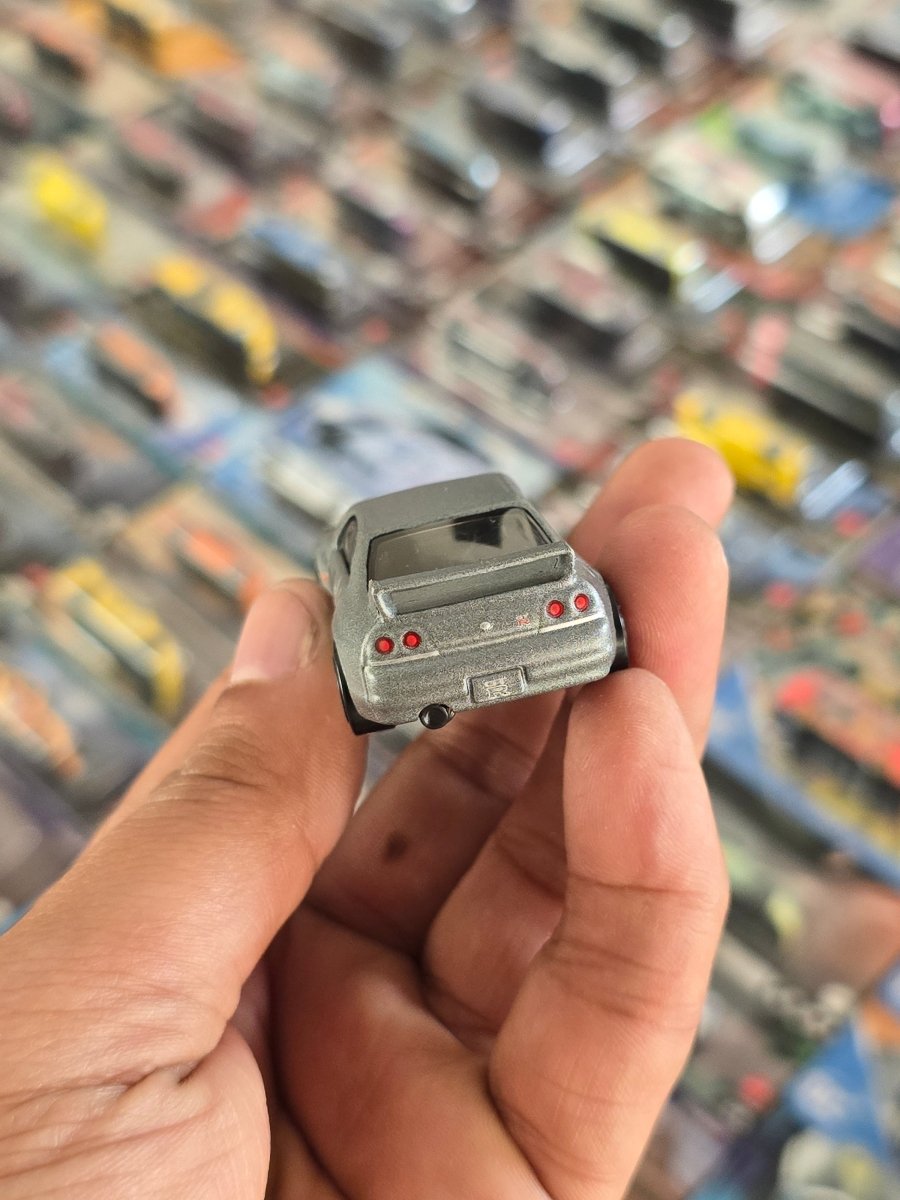 Hot Wheels Nissan Skyline GT - R R33 GODZILLA (Uncarded) - Kinder Logs