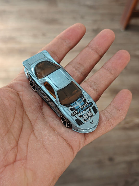 Hot Wheels Pontiac IROC Firebird Cortez Racing (Uncarded - New) - Kinder Logs