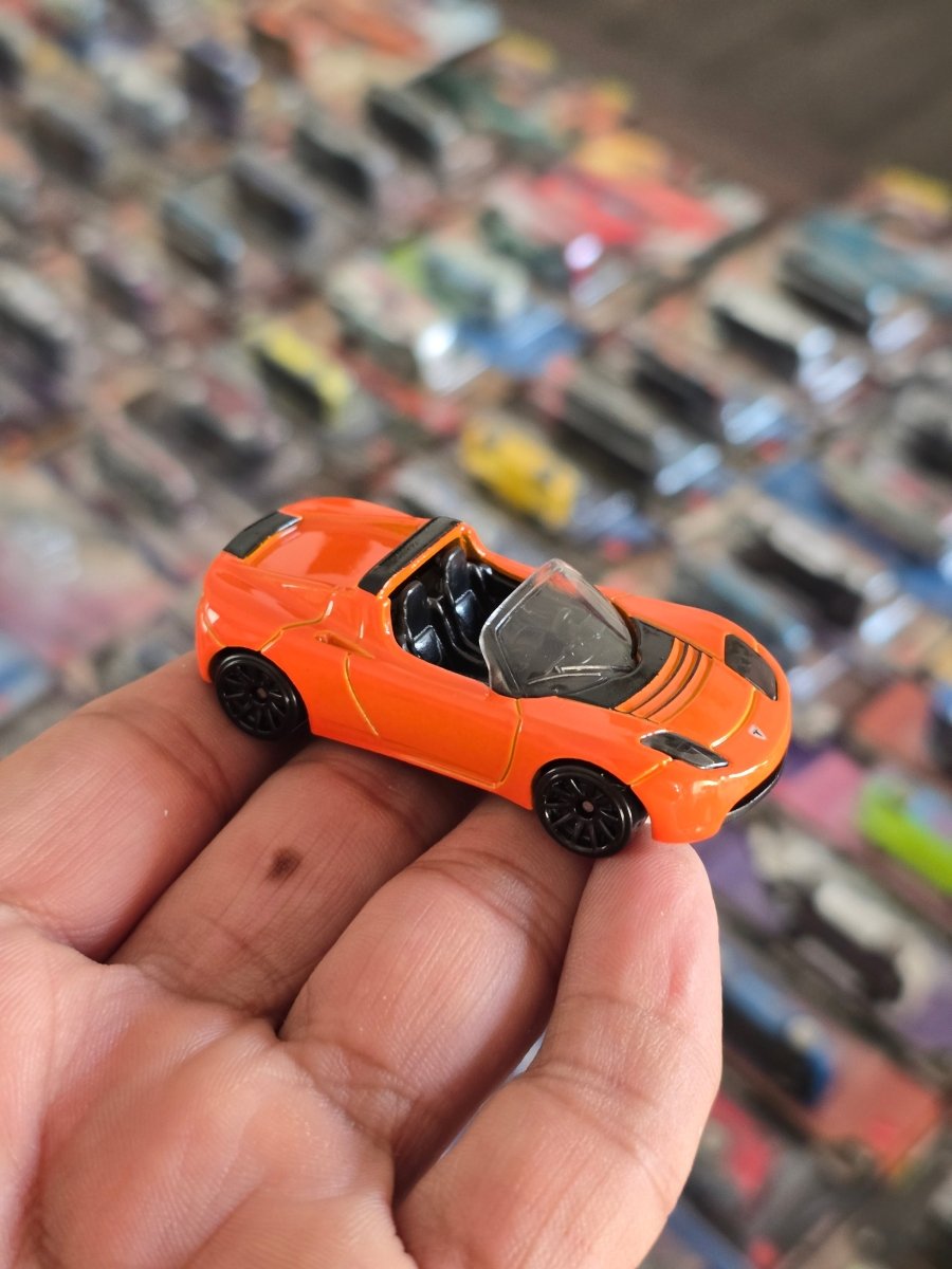 Hot Wheels Tesla Roadster - Orange (Uncarded) - Kinder Logs