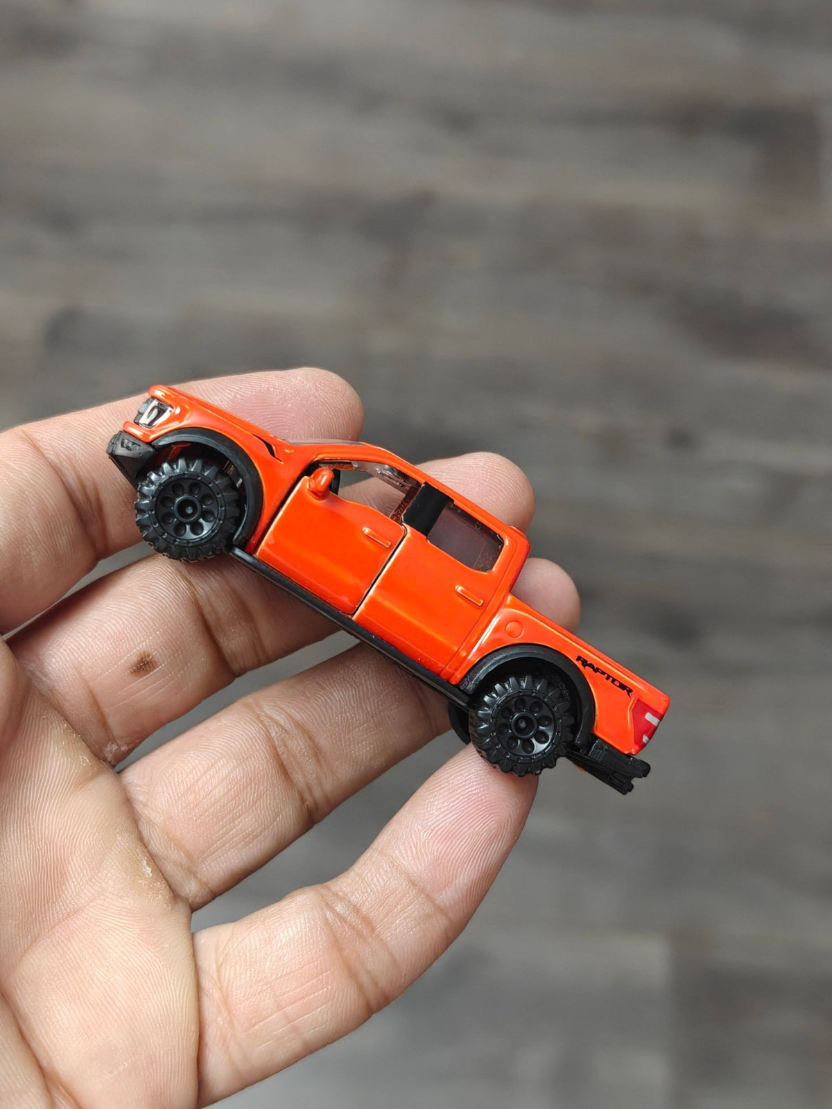 Majorette Ford F - 150 Raptor - Orange (Uncarded - New) - Kinder Logs