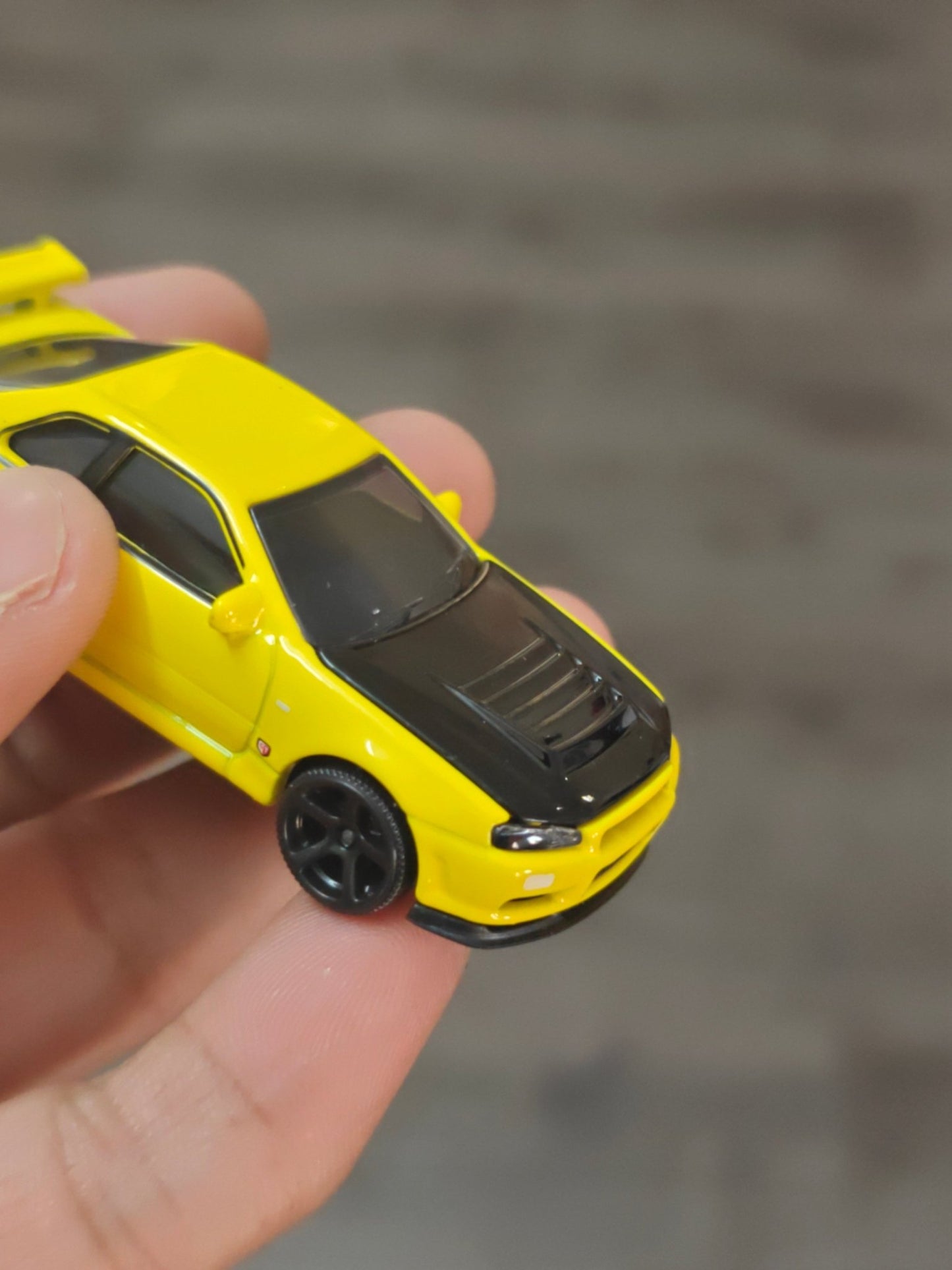 Majorette JDM Nissan Skyline GT - R (R34) - Yellow (Uncarded - New) - Kinder Logs