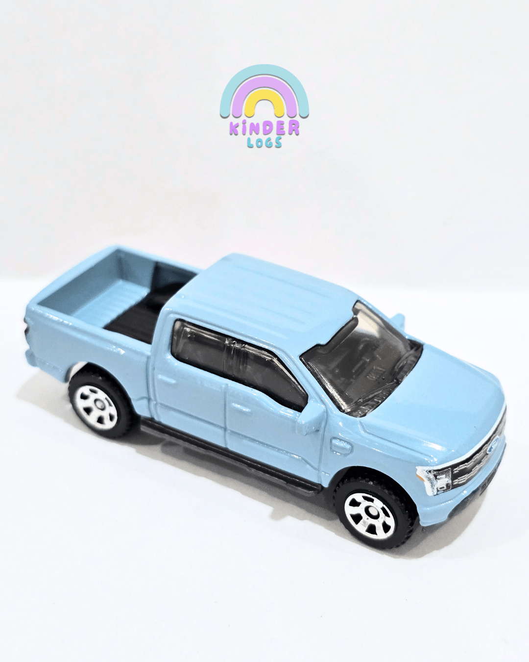 Matchbox 2022 Ford F - 150 Lightning - Light Blue (Uncarded) - Kinder Logs