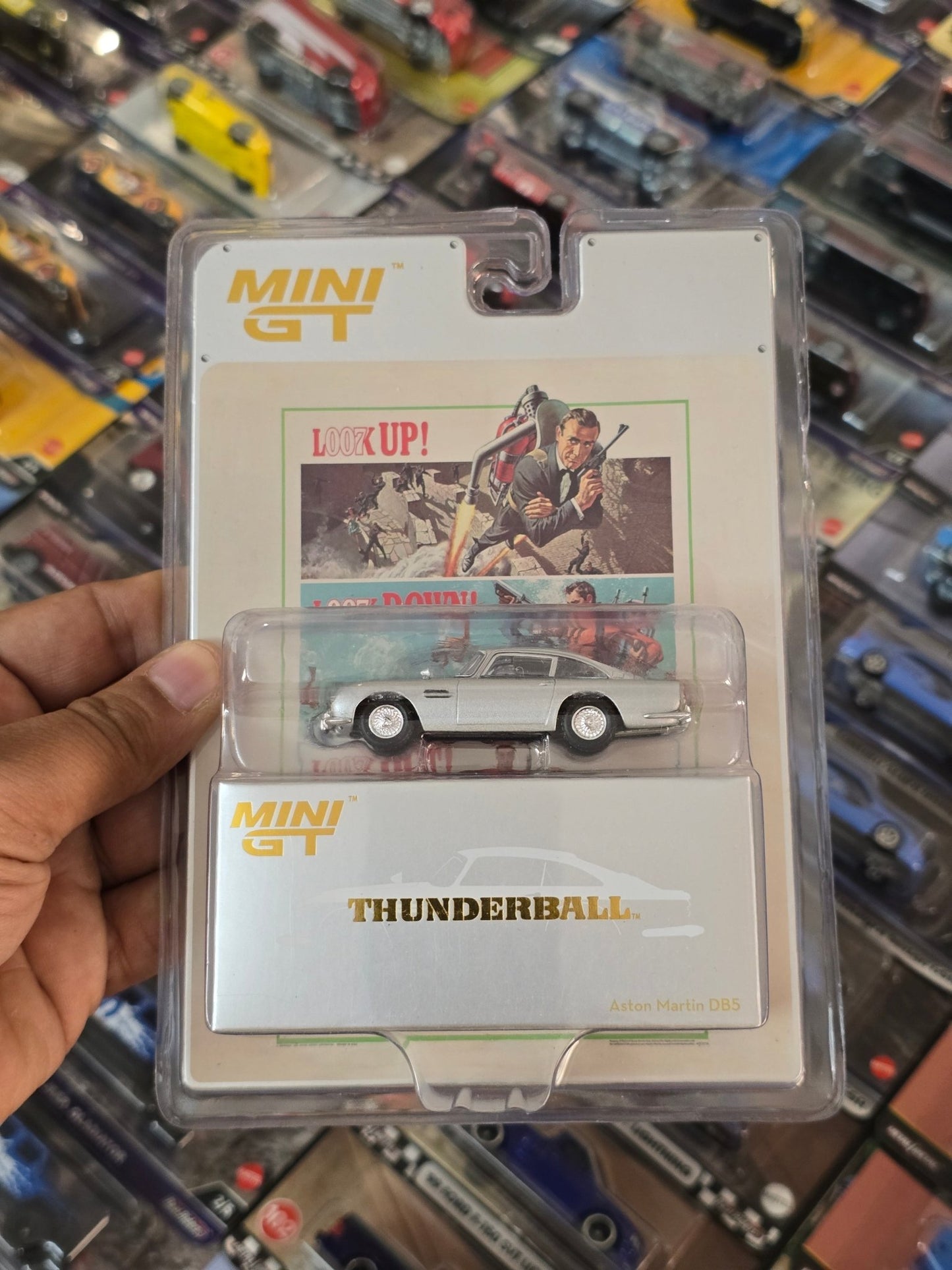 Mini GT Aston Martin DB5 “Thunderball” - Blister Pack - Kinder Logs