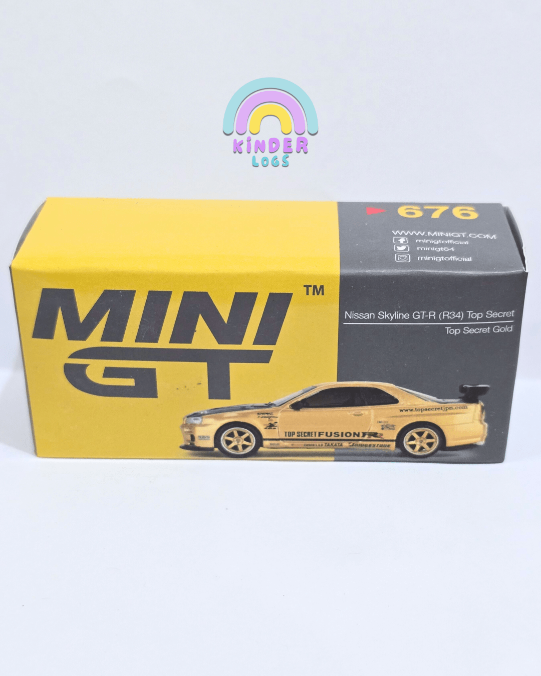 Mini GT Nissan Skyline GT - R (R34) Top Secret Gold - Open Box - Kinder Logs