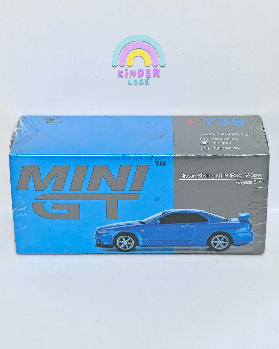 Mini GT Nissan Skyline GT - R (R34) V - Spec - Bayside Blue (Sealed Box) - Kinder Logs