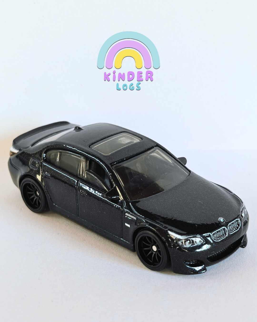 Premium Hot Wheels 2010 BMW M5 - Black (Scratches on Windshield) - Kinder Logs