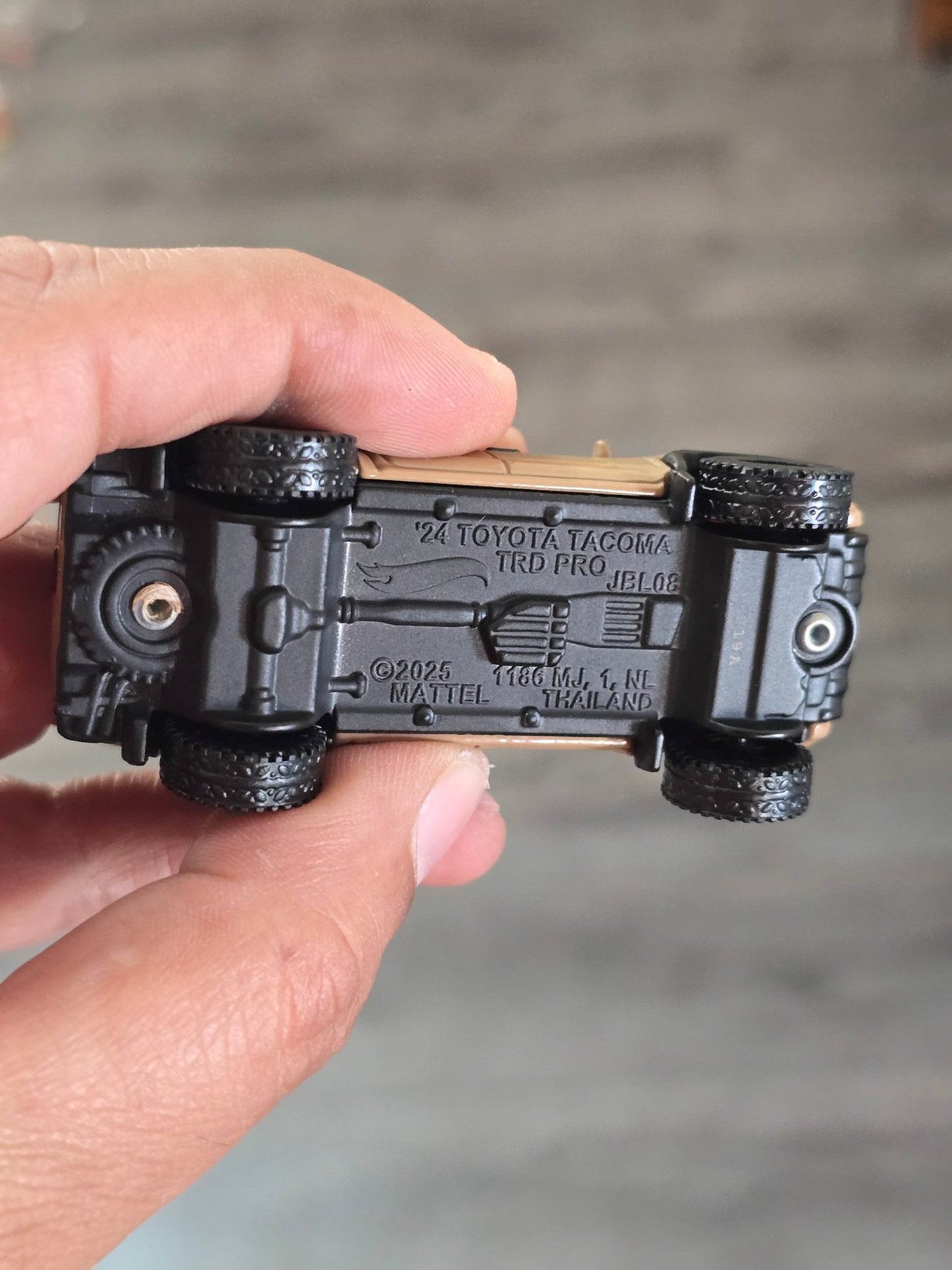 Premium Hot Wheels 2024 Toyota Tacoma TRD Pro (Uncarded - New) - Kinder Logs