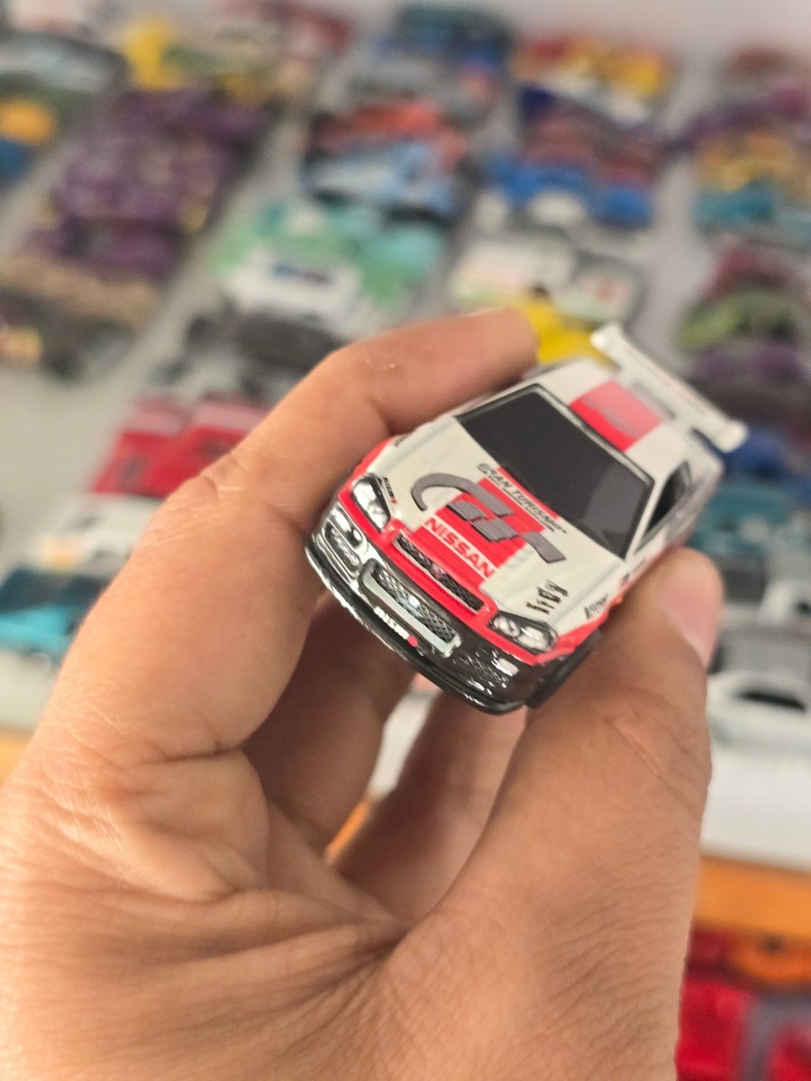 Premium Hot Wheels Nissan Skyline GT - R (BNR34) - Gran Turismo 7 (Uncarded) - Kinder Logs