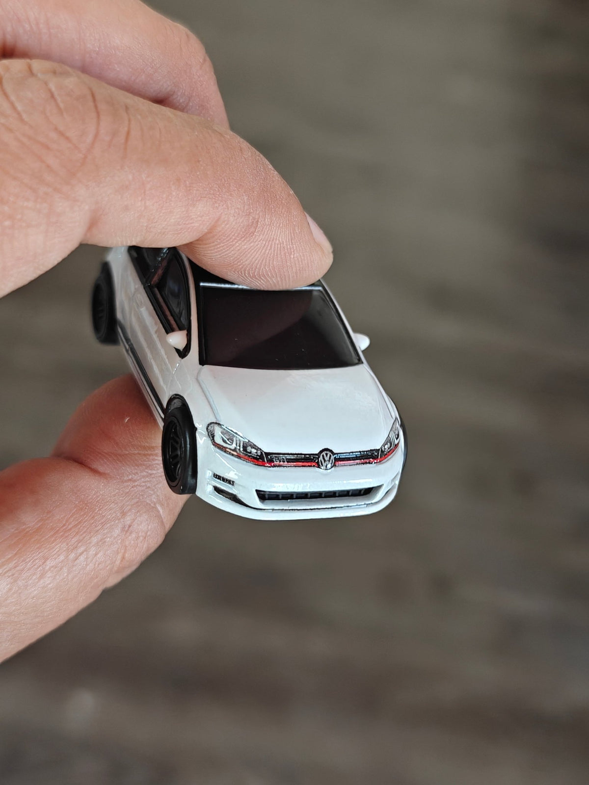 Premium Hot Wheels Volkswagen Golf MK7 GTI - Deutschland Design (Uncarded - New) - Kinder Logs