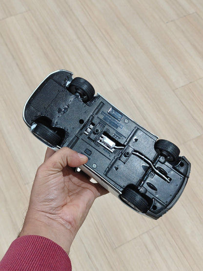 1:18 Bburago 2009 Nissan GT - R (Pre - Owned) - Kinder Logs