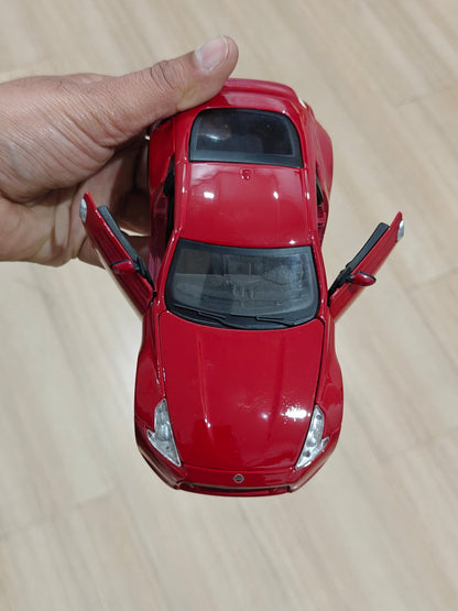 1:24 Maisto 2009 Nissan Z (Pre - Owned) - Kinder Logs