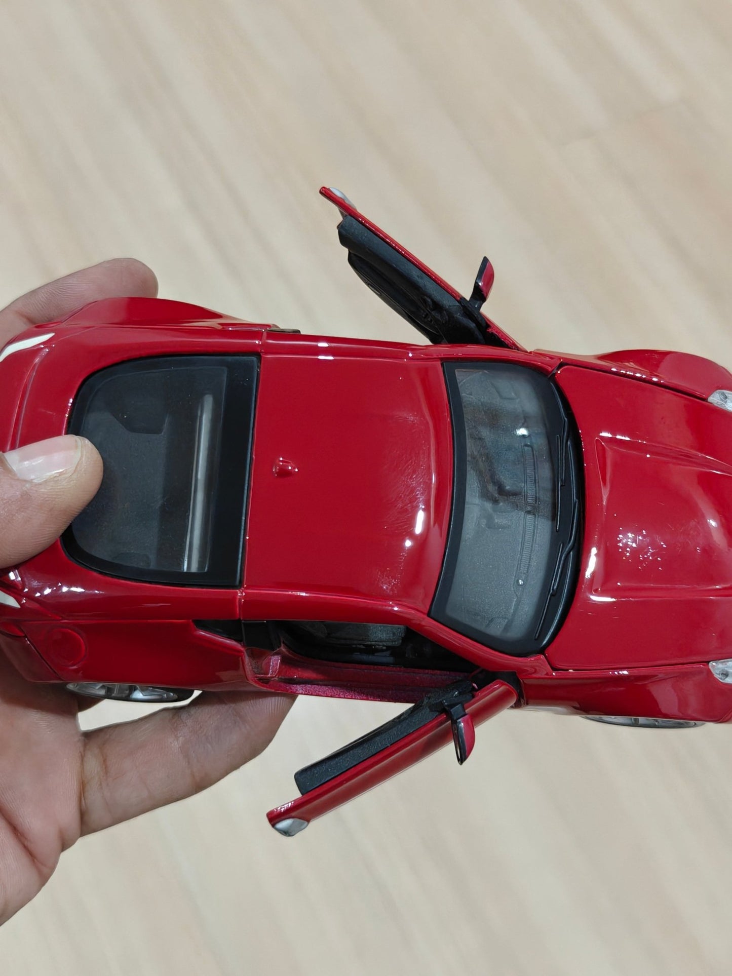 1:24 Maisto 2009 Nissan Z (Pre - Owned) - Kinder Logs