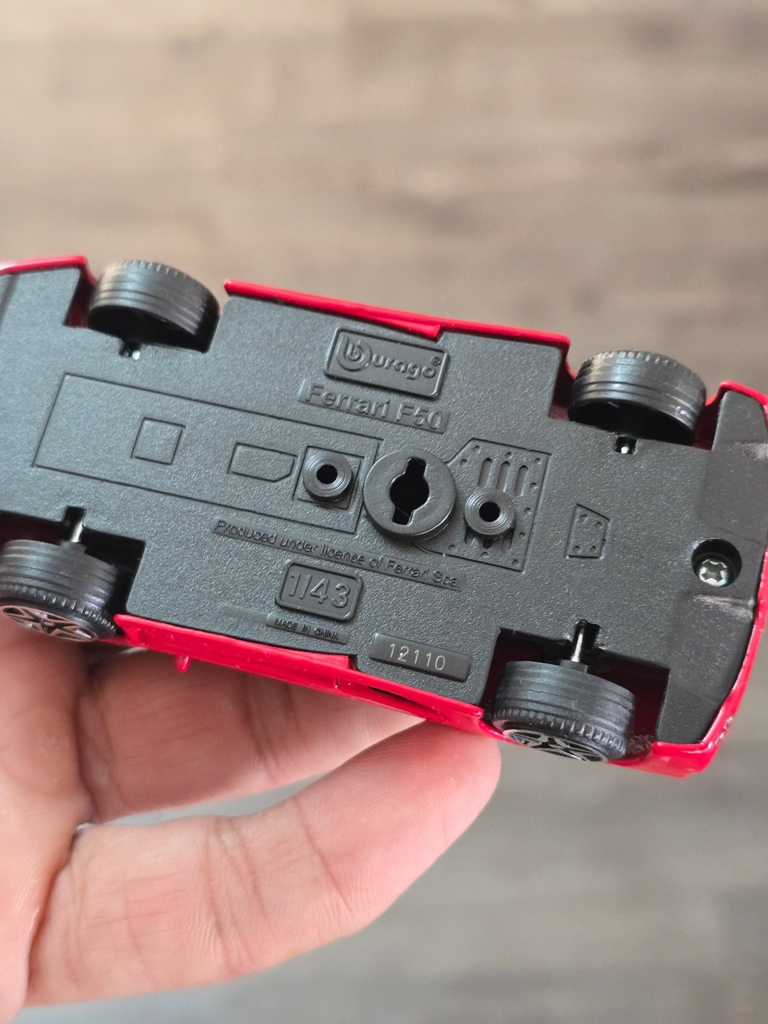 1:43 Bburago Ferrari F50 - Red (Uncarded - New) - Kinder Logs