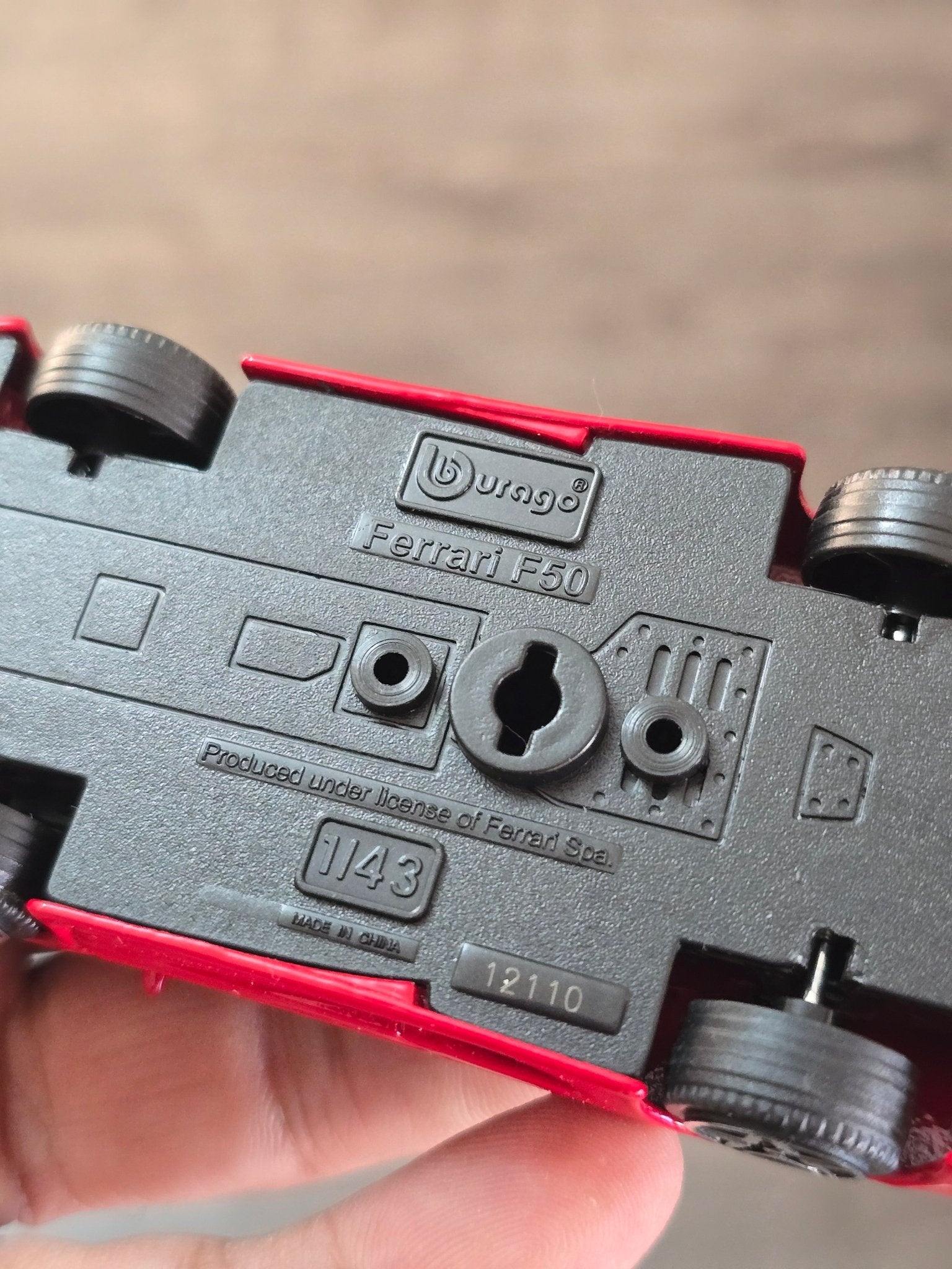 1:43 Bburago Ferrari F50 - Red (Uncarded - New) - Kinder Logs