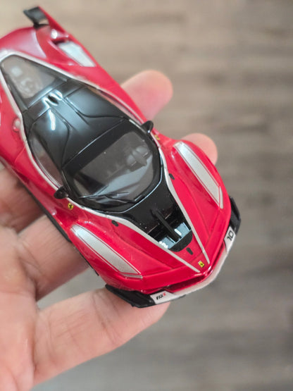 1:43 Bburago Ferrari FXX K Number 10 - Red (Uncarded - New) - Kinder Logs