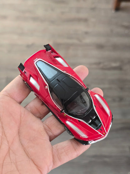 1:43 Bburago Ferrari FXX K Number 10 - Red (Uncarded - New) - Kinder Logs