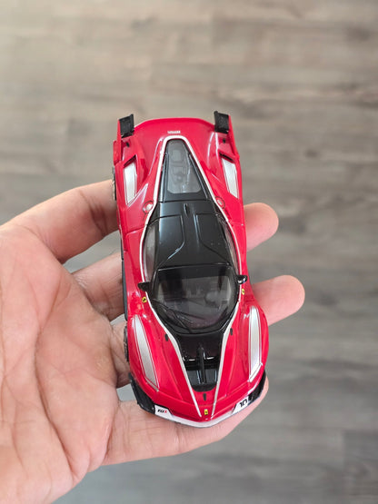1:43 Bburago Ferrari FXX K Number 10 - Red (Uncarded - New) - Kinder Logs