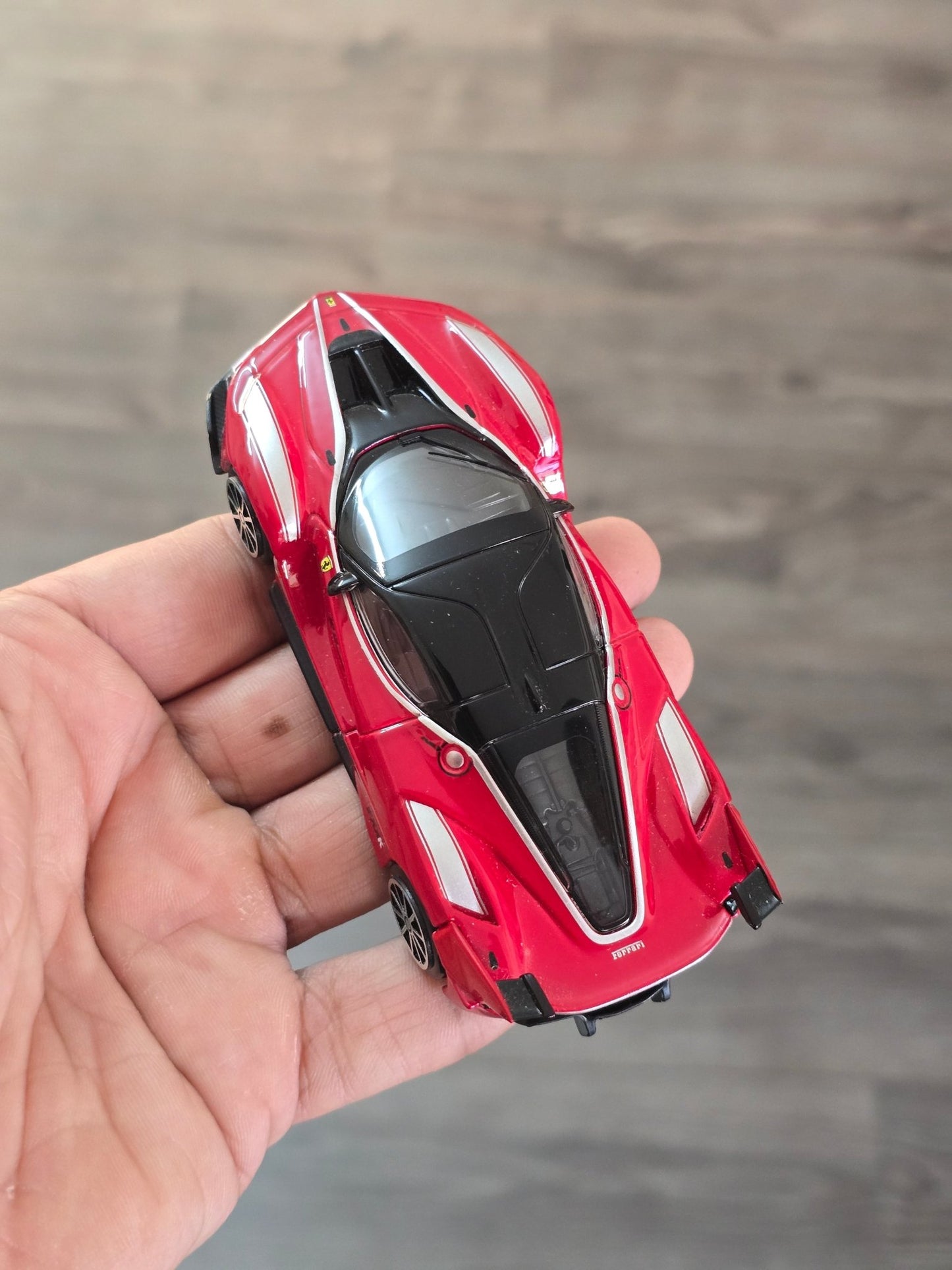 1:43 Bburago Ferrari FXX K Number 10 - Red (Uncarded - New) - Kinder Logs